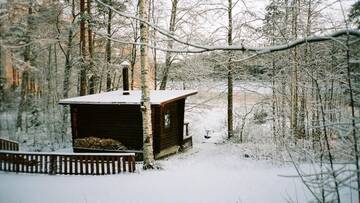 Фото номера Коттедж «Озеро» с сауной Дома для отпуска Fish &amp; Fun Holiday Cottages г. Paaso 11